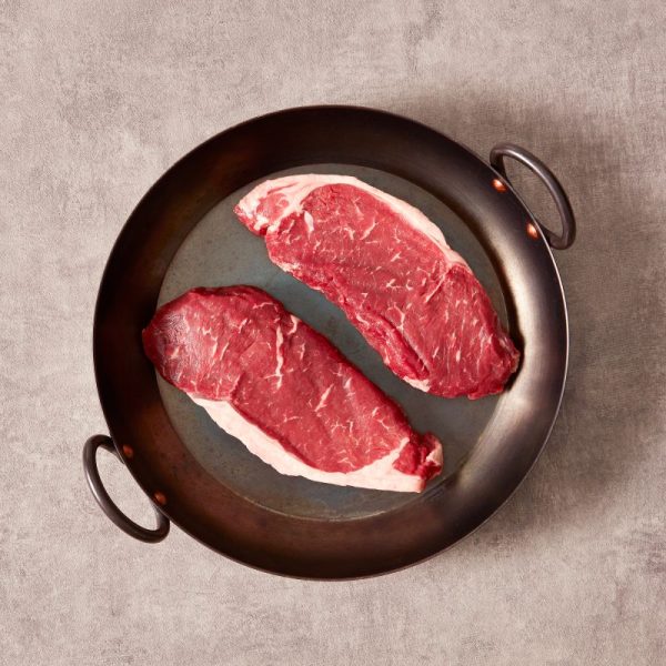 Wagyu x sirloin steak in a pan
